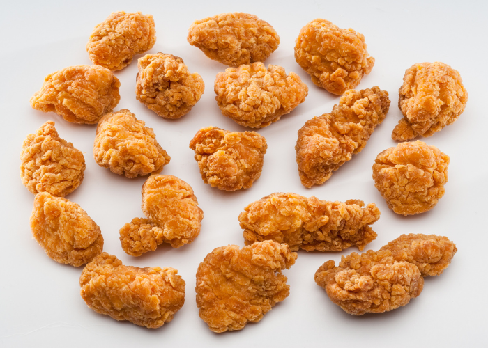 chicken nuggets on gray background