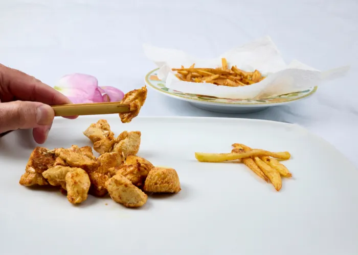 small pieces of fried chicken on the table