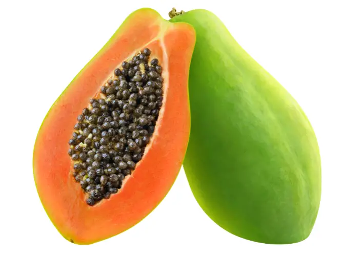 papaya cut in half on a white background
