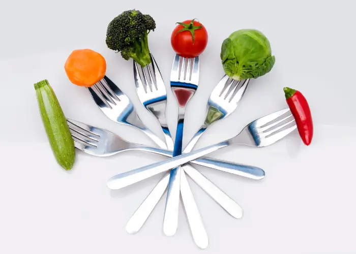 vegetables skewered in forks